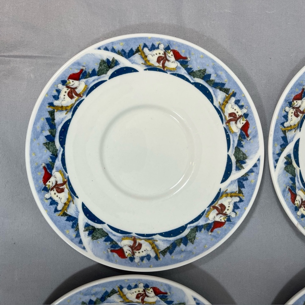 Set of 4 Snow Valley saucers by Oneida. Winter / Christmas theme